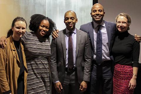 Left to right: Madi Donham, Ja'nell Ajani, Dr. Khalil Gibran Muhammad, Dr. Peniel Joseph, and Emily Dunklee